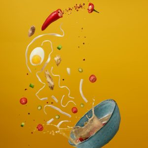 An Animation of Spilled Soup on a Yellow Background