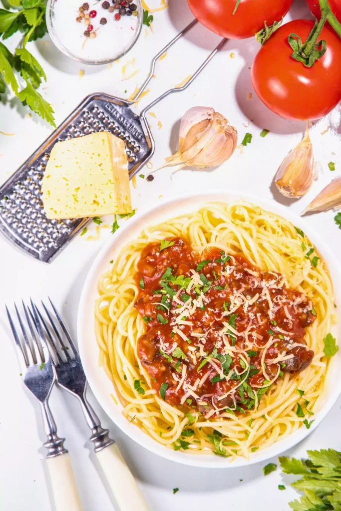 A hearty spaghetti sauce, filled with ground beef, sausage, diced tomatoes, and fresh herbs.