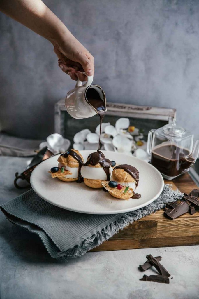 12. Chocolate Profiteroles: The Puffy Clouds of Joy - Pinned Recipe