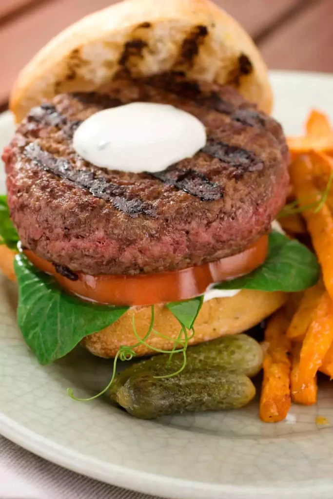  Lamb Burger with Harissa, Goat Cheese, and Pickled Cabbage